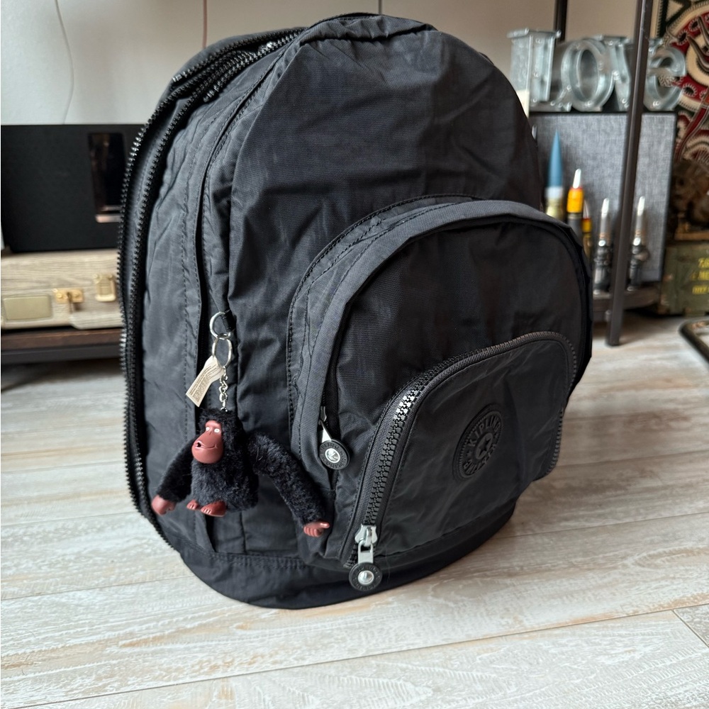 ***SOLD, on other  platform***
 Charcoal Backpack with Monkey Keychain